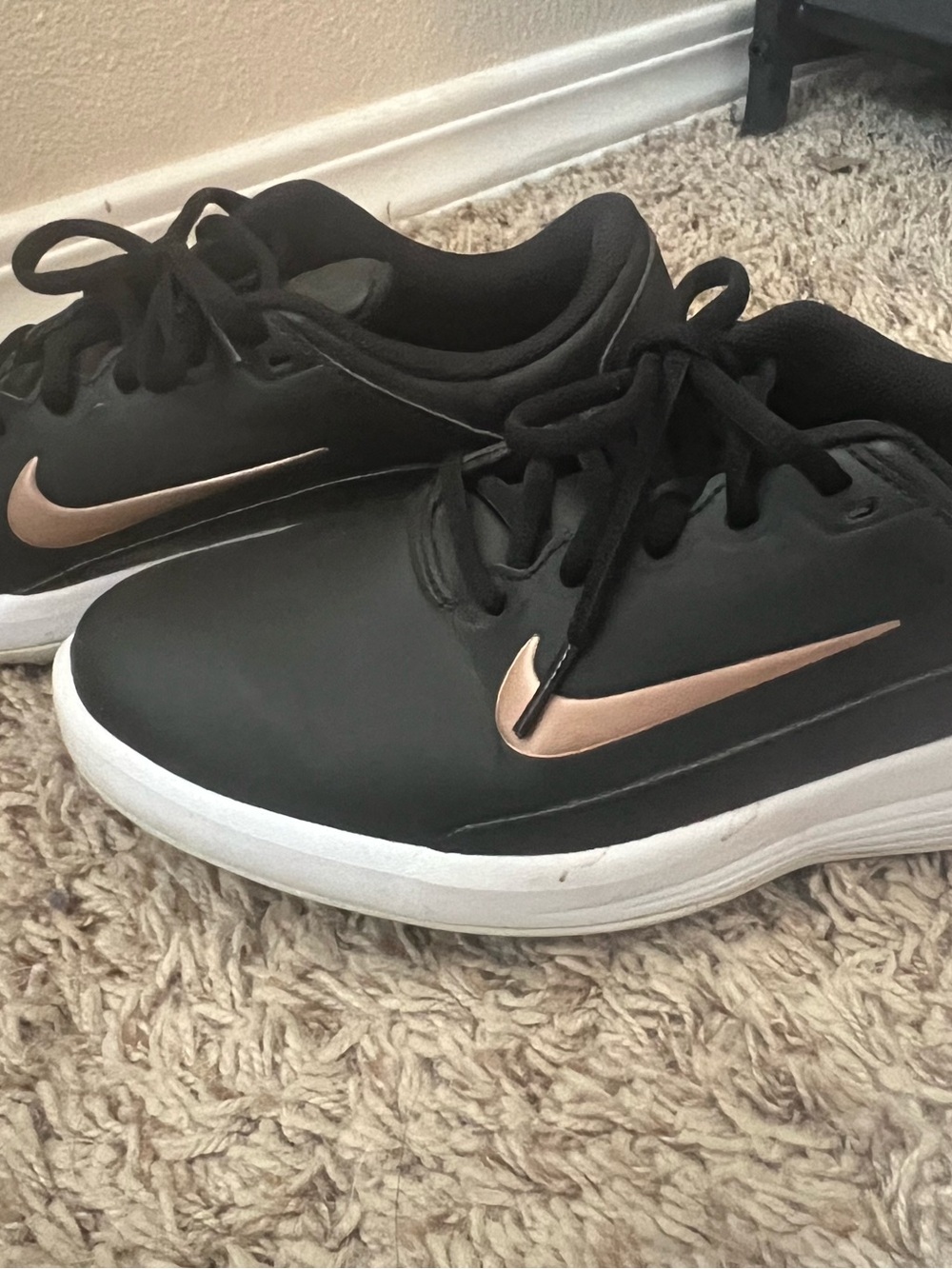 Nike Black Golf Shoes with Rose-Gold Swoosh